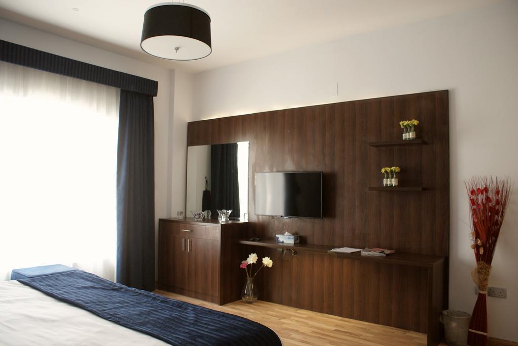 Weekend Hotel & Apartments Maskat Oda fotoğraf
